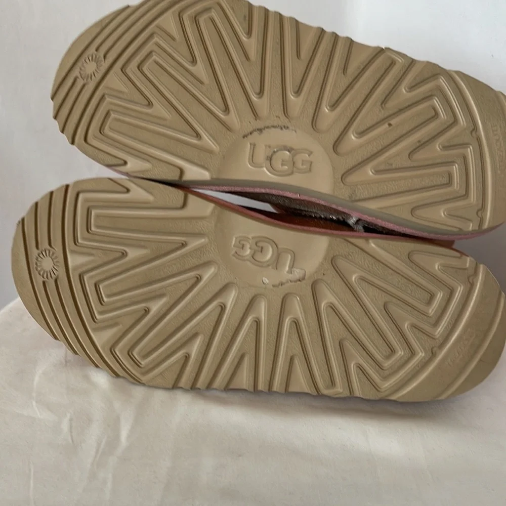 UGG boots size 6 metallic rose gold trimmed in pink with tan soles